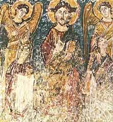 A Fresco portraying Saints Cyrilus and Methodius standing before Christ and two angels, 11th century, the crypt of Saint Clement's church Rome, Italy.
